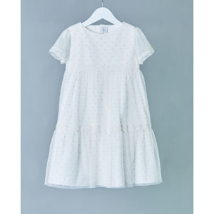 Vestido de tul bordado plumeti de manga corta. Falda de volantes y puntilla.