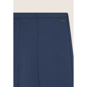 Pantaloni slim con gamba ampia e dettaglio piping