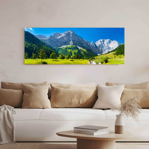 Tableau panoramique alpages lumineux et sommets alpins ciel bleu Toile imprimée