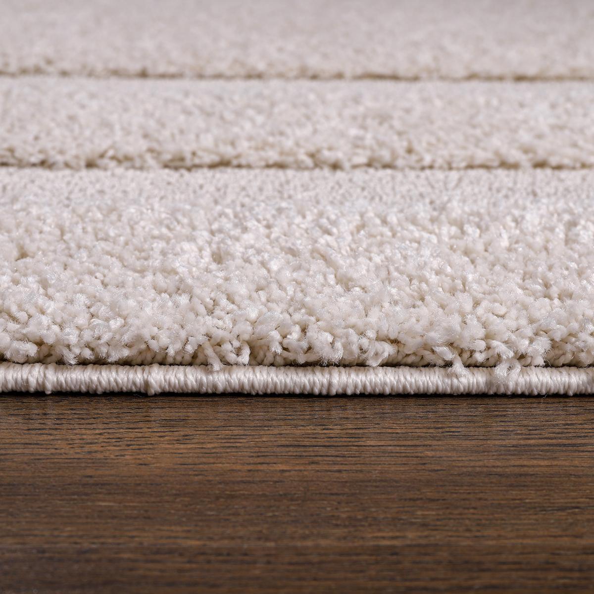 Tapis salon et chambre tissé motif faux uni KUNE