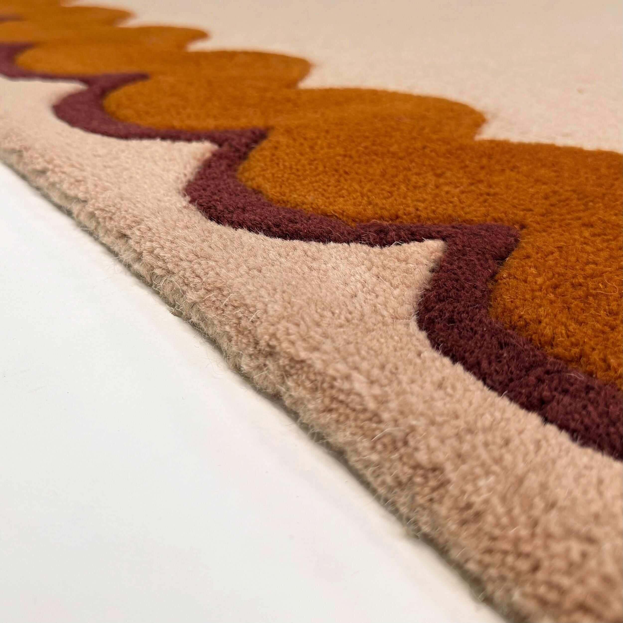 Tapis à bordure en laine WIGGLE
