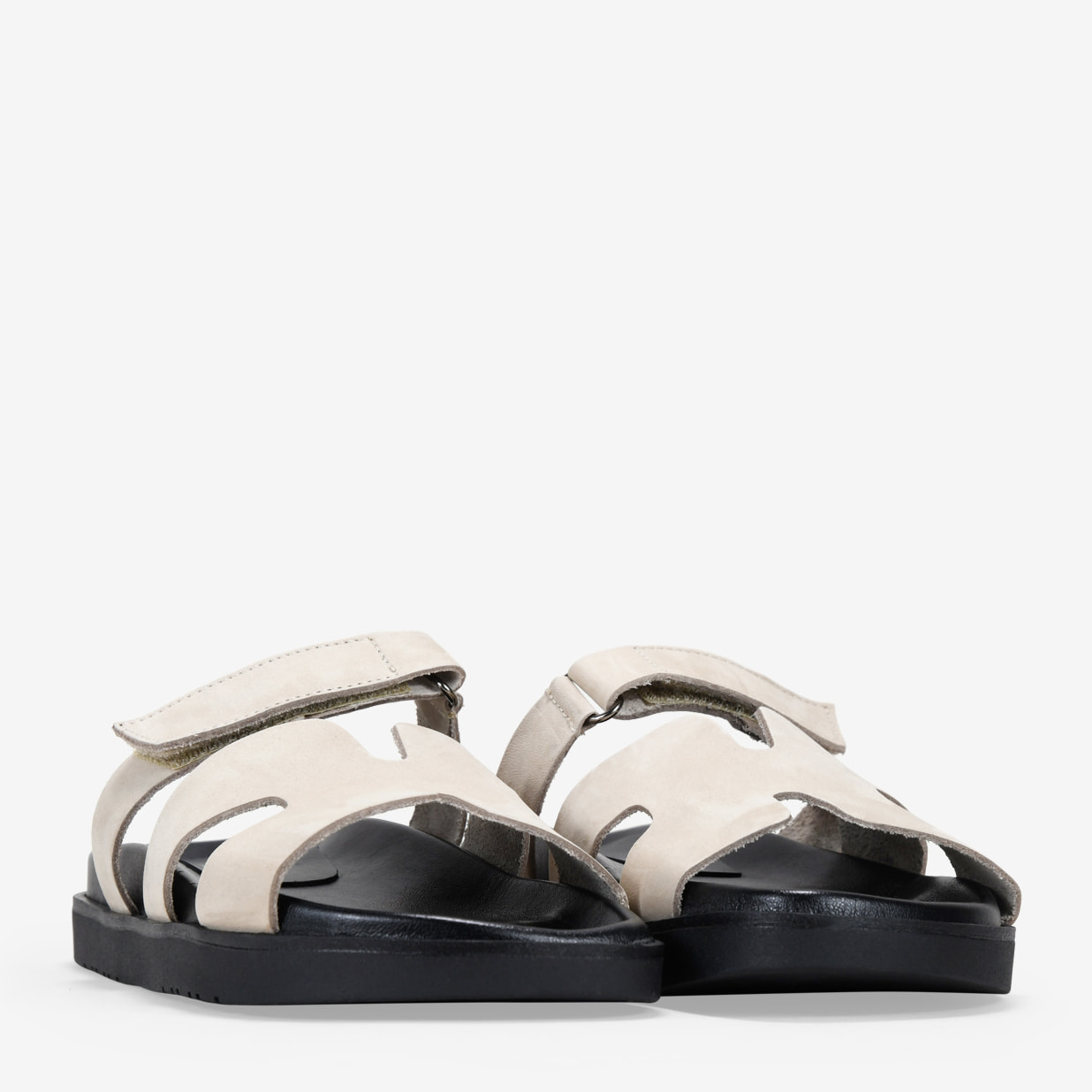 Sandalias planas blancas en piel