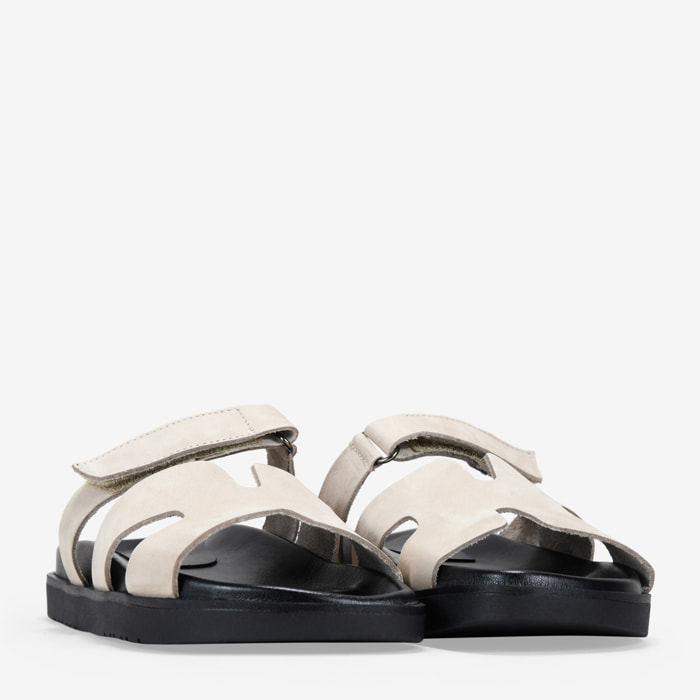 Sandalias planas blancas en piel