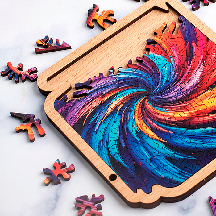 Puzzle e cornice in legno con 77 pezzi. Design Tornado colorato.