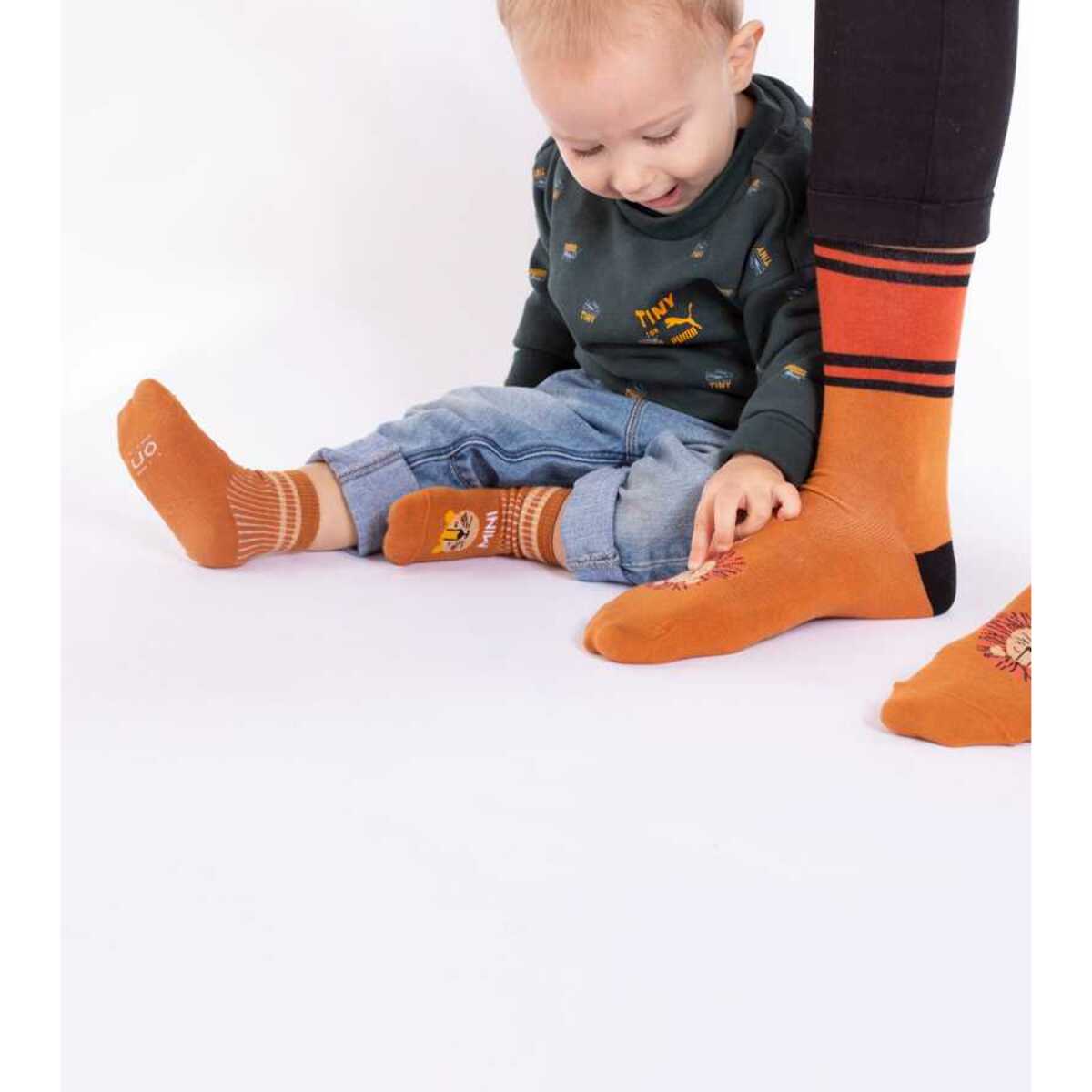 Mini calcetines "Mini león" Teja