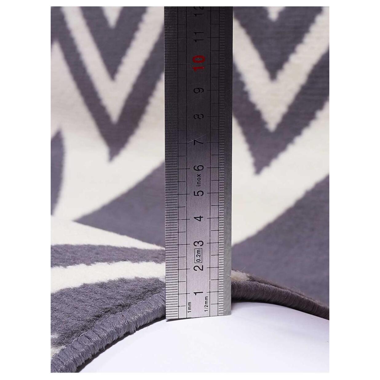 Petit tapis d'entrée motif géométrique noir et beige