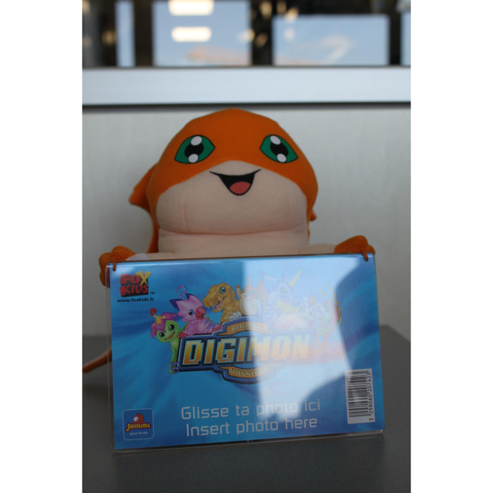 Digimon - Peluche Digimon arancione con cornice davanti 20cm