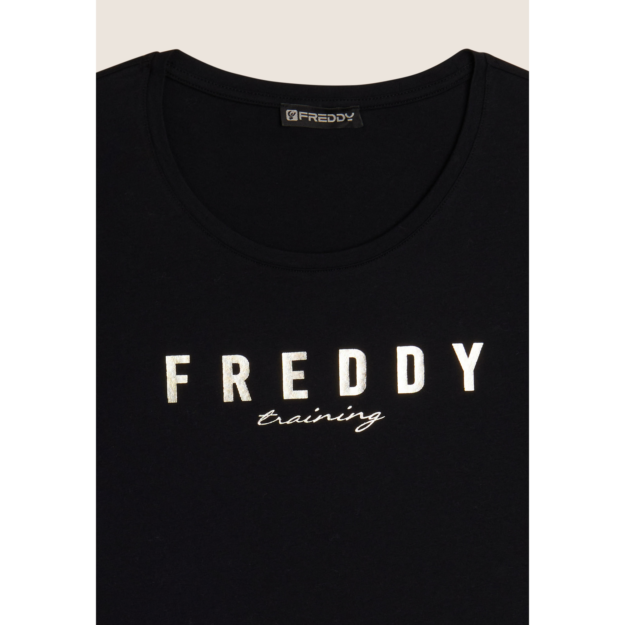 T-shirt in jersey con logo oro chiaro sul fronte