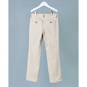 Pantalón largo, de sarga beige. Con bolsillos y bragueta.