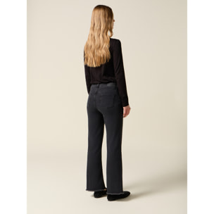Oltre - Jeans acampanados negros con dobladillo deshilachado - Negro