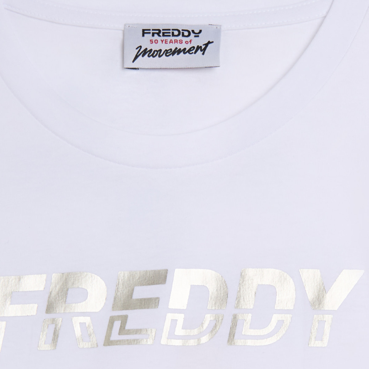 T-shirt cropped con inserto a contrasto e logo perlato