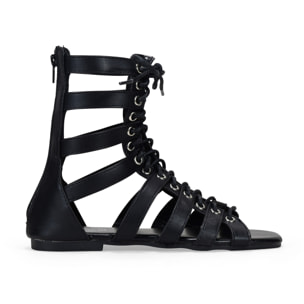 Sandalias planas romanas negras con cremallera trasera