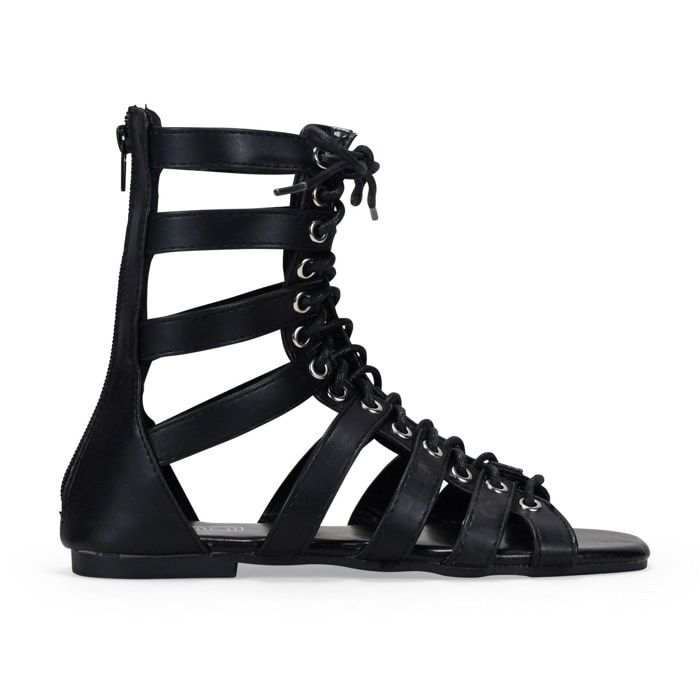 Sandalias planas romanas negras con cremallera trasera