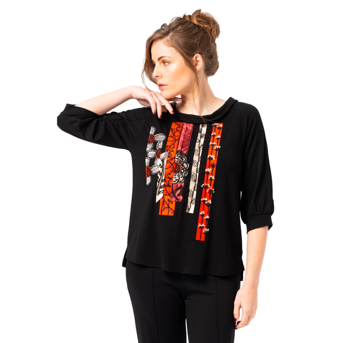 Mamatayoe Oleo. Camiseta de Manga Tres Cuartos para Mujer de Color Negro con Detalles Bordados para Otoño Invierno. Top de Punto Roma con Cuello Vuelto, Original y Elegante.