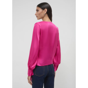 Blusa incrociata con fusciacca