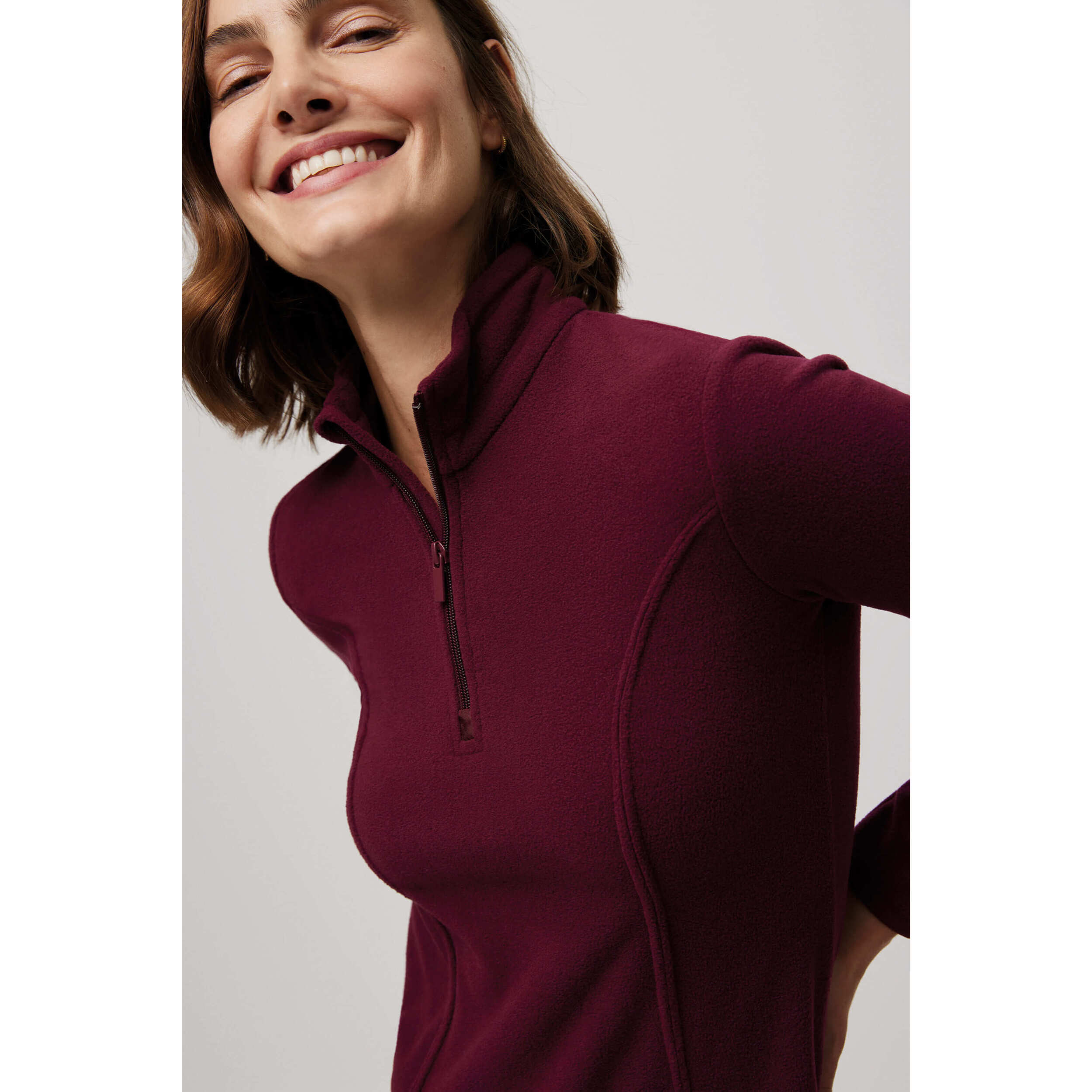 Pile da donna con mezza zip color bordeaux