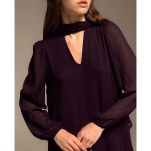 Vestido corto manga abullonada y lazada