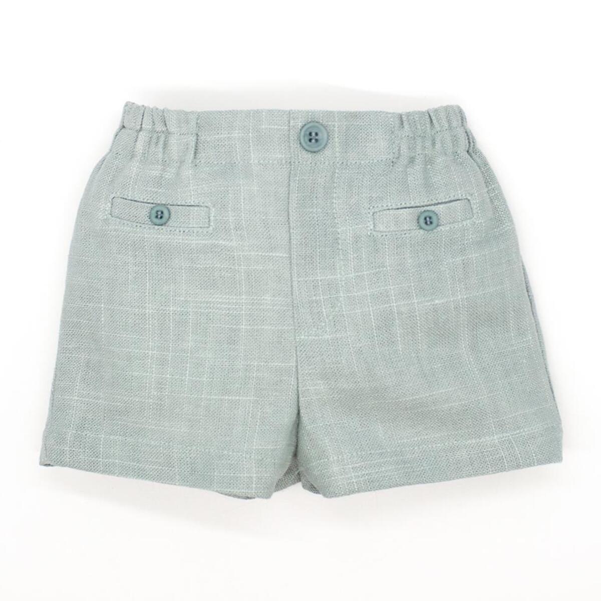 Bermuda de lino verde. Bolsillos falsos y botones, cintura elastica.