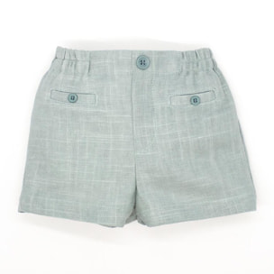 Bermuda de lino verde. Bolsillos falsos y botones, cintura elastica.