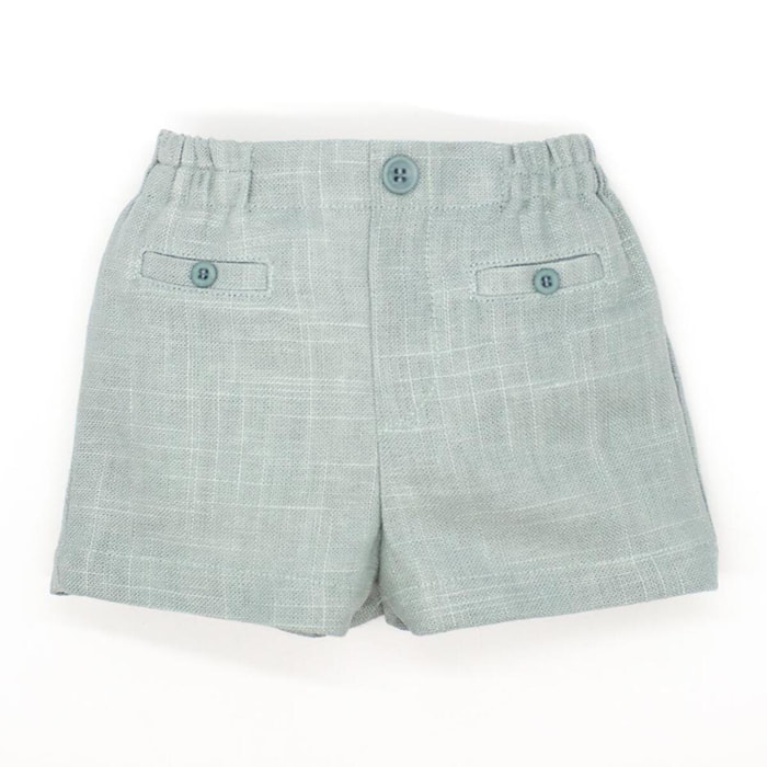 Bermuda de lino verde. Bolsillos falsos y botones, cintura elastica.