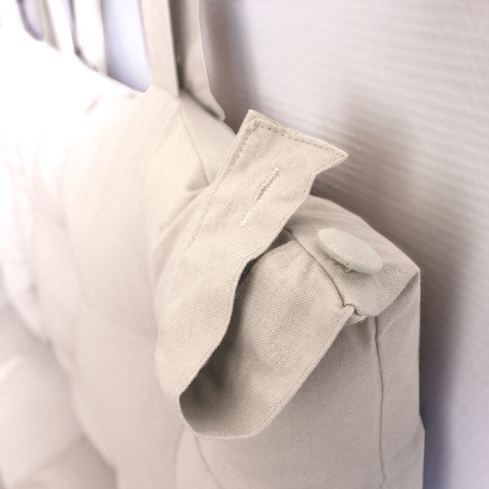 Coussin tête de lit en coton et pattes boutonnées - Ecru