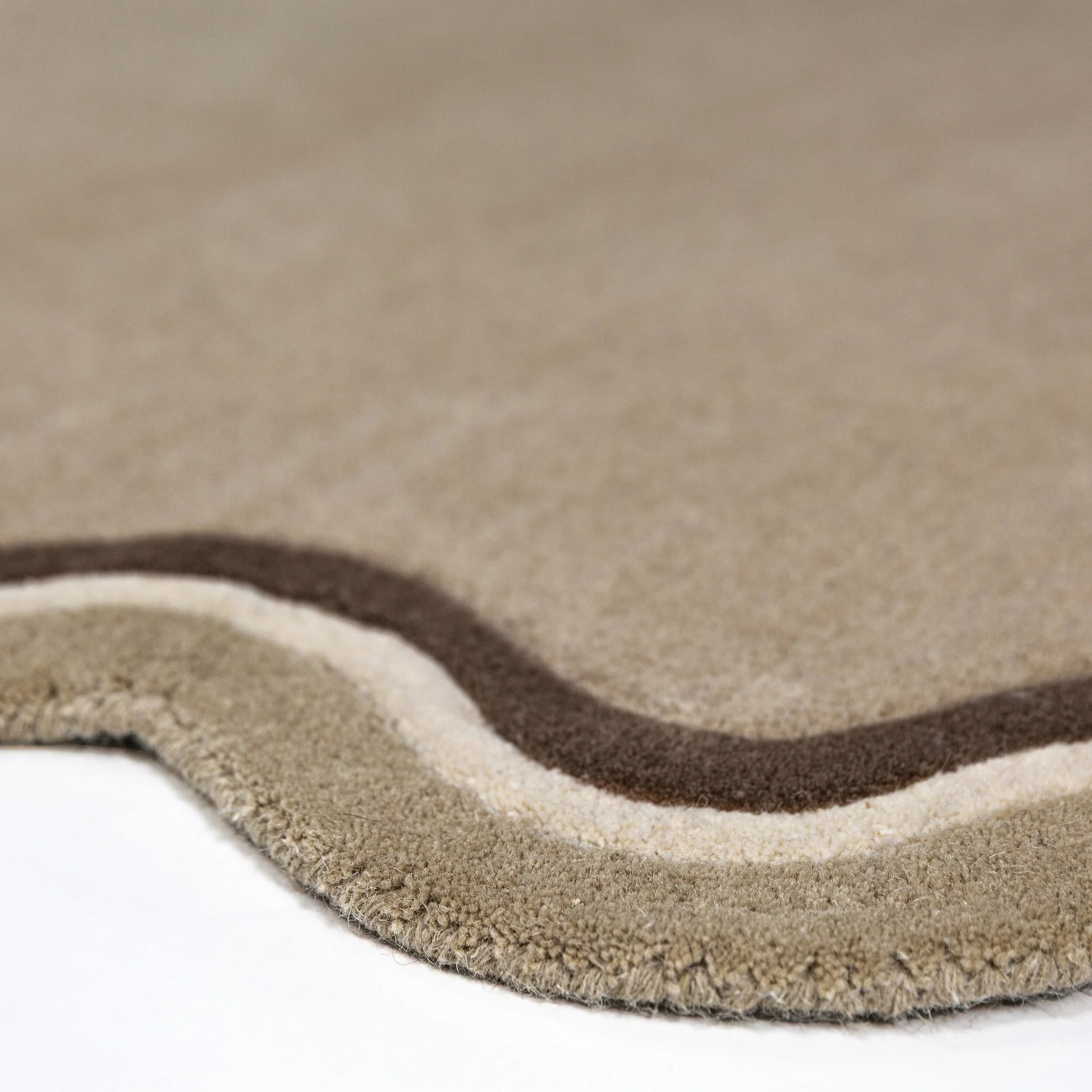 Tapis en laine rond LOIS SCALLOP