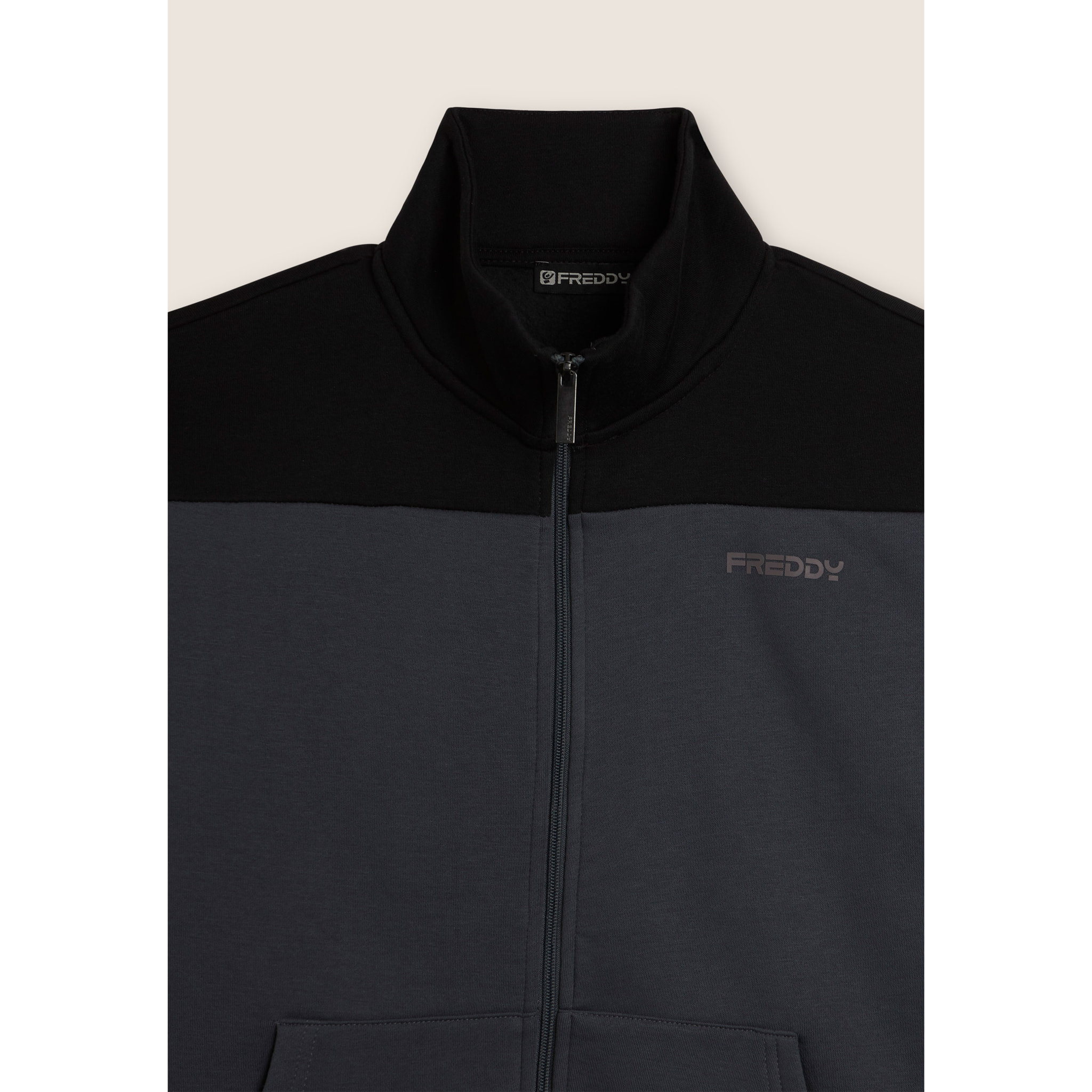 Tuta collo alto con full zip e dettagli colour block