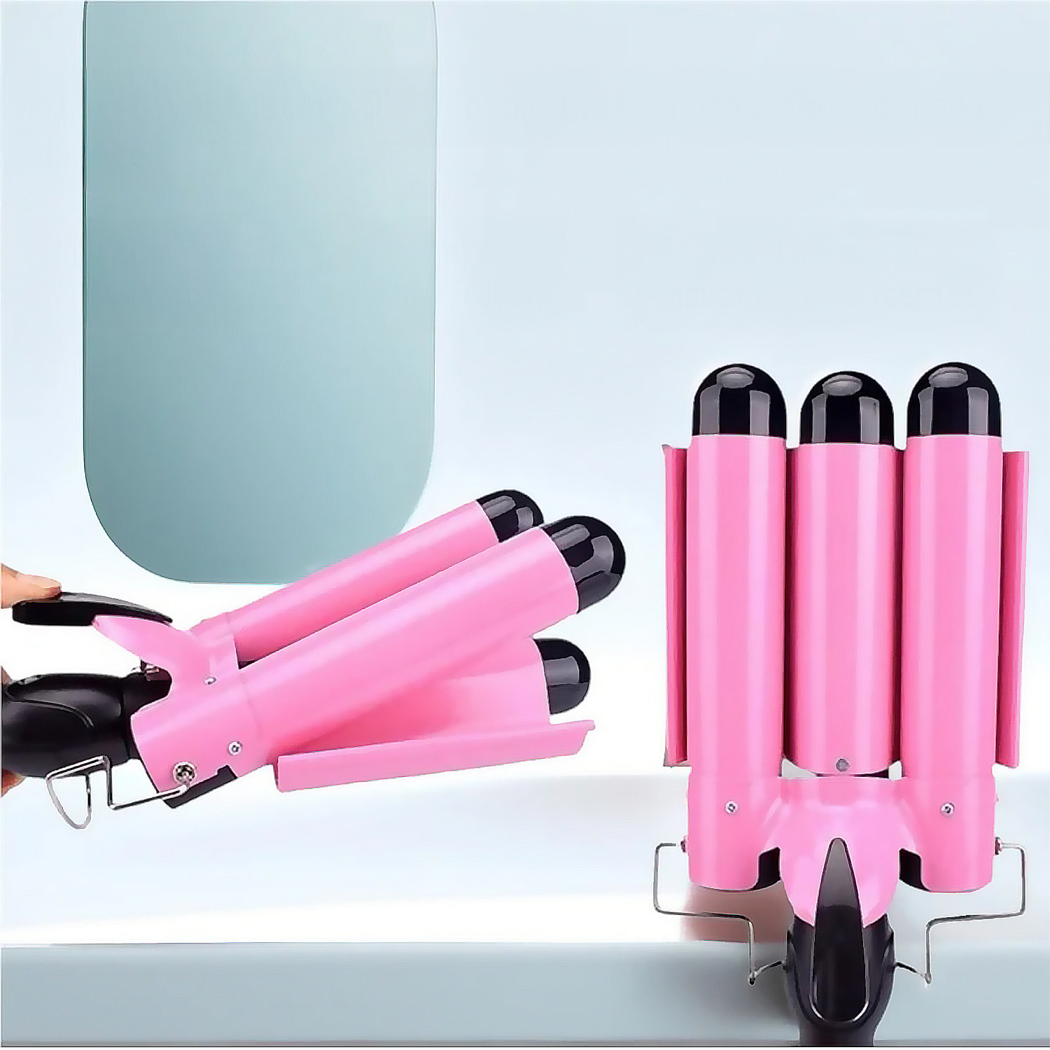 Rizador de 3 tubos con cuerpo calefactor PTC y 2 niveles de temperatura.