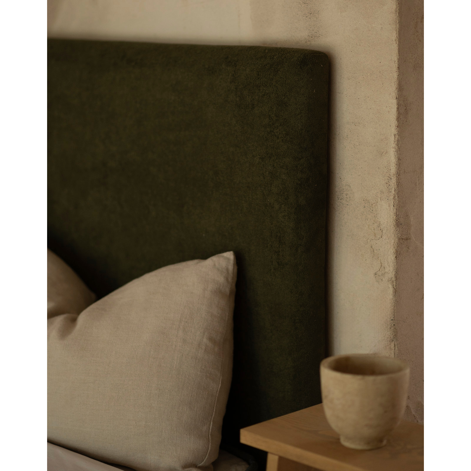 Cabecero tapizado en color verde de varias medidas