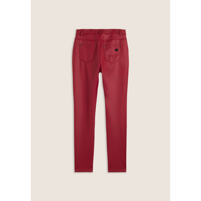 Pantaloni skinny in similpelle con logo ricamato