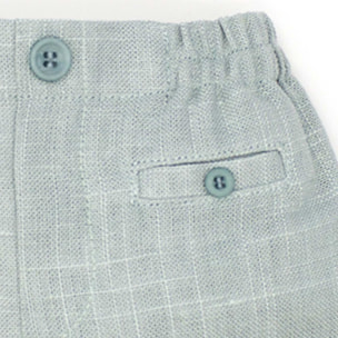 Bermuda de lino verde. Bolsillos falsos y botones, cintura elastica.