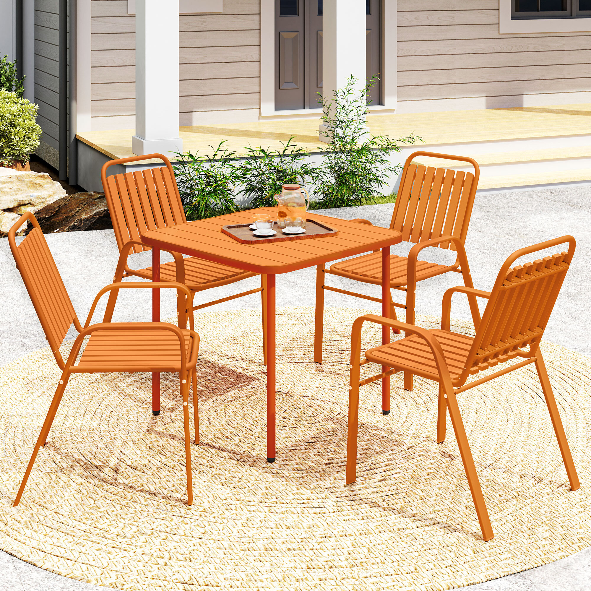 Salon de jardin extérieur 4 places 5 pièces - chaises empilables - plateau effet bois acier orange