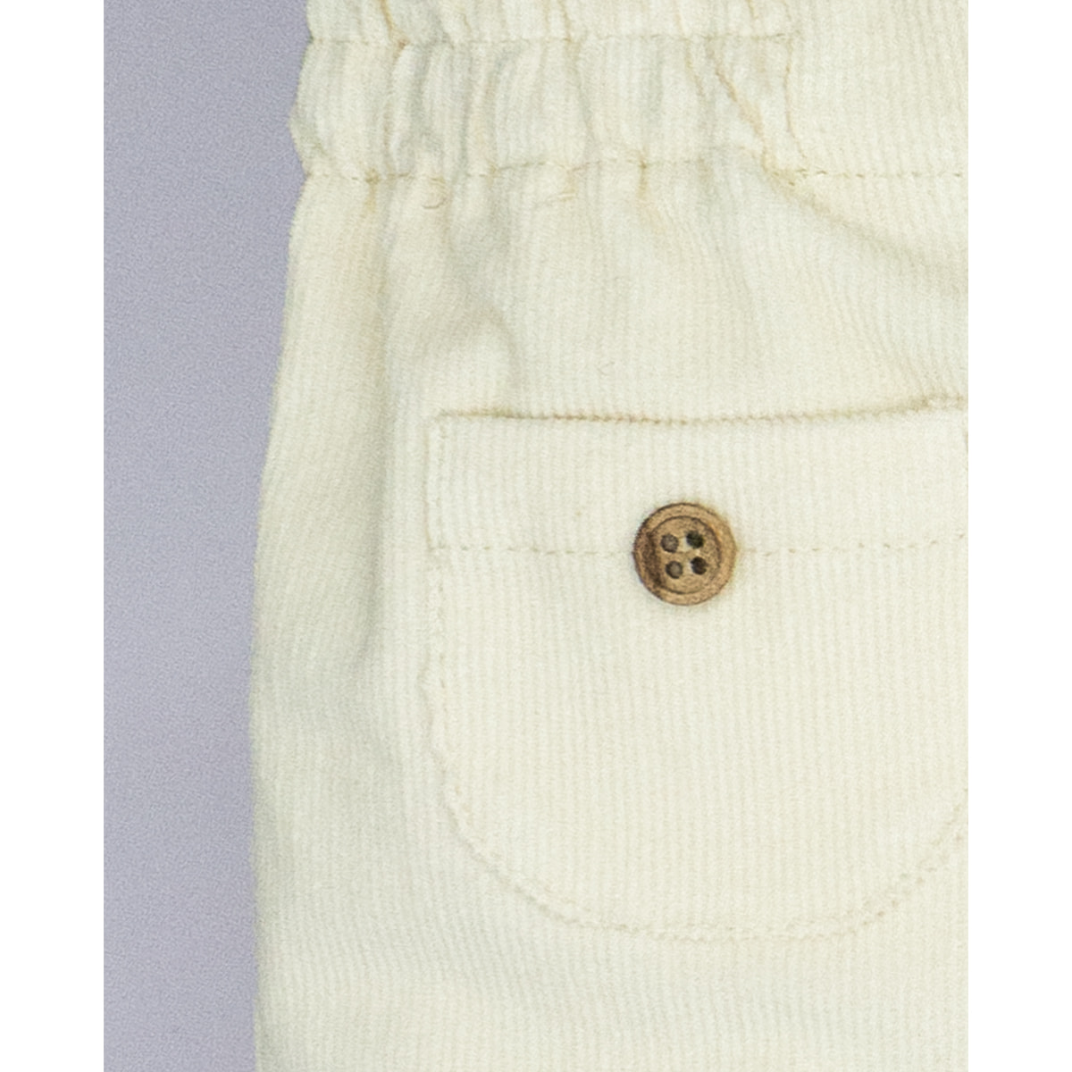 PANTALÓN GOMAS BAJO PANA BLANCO