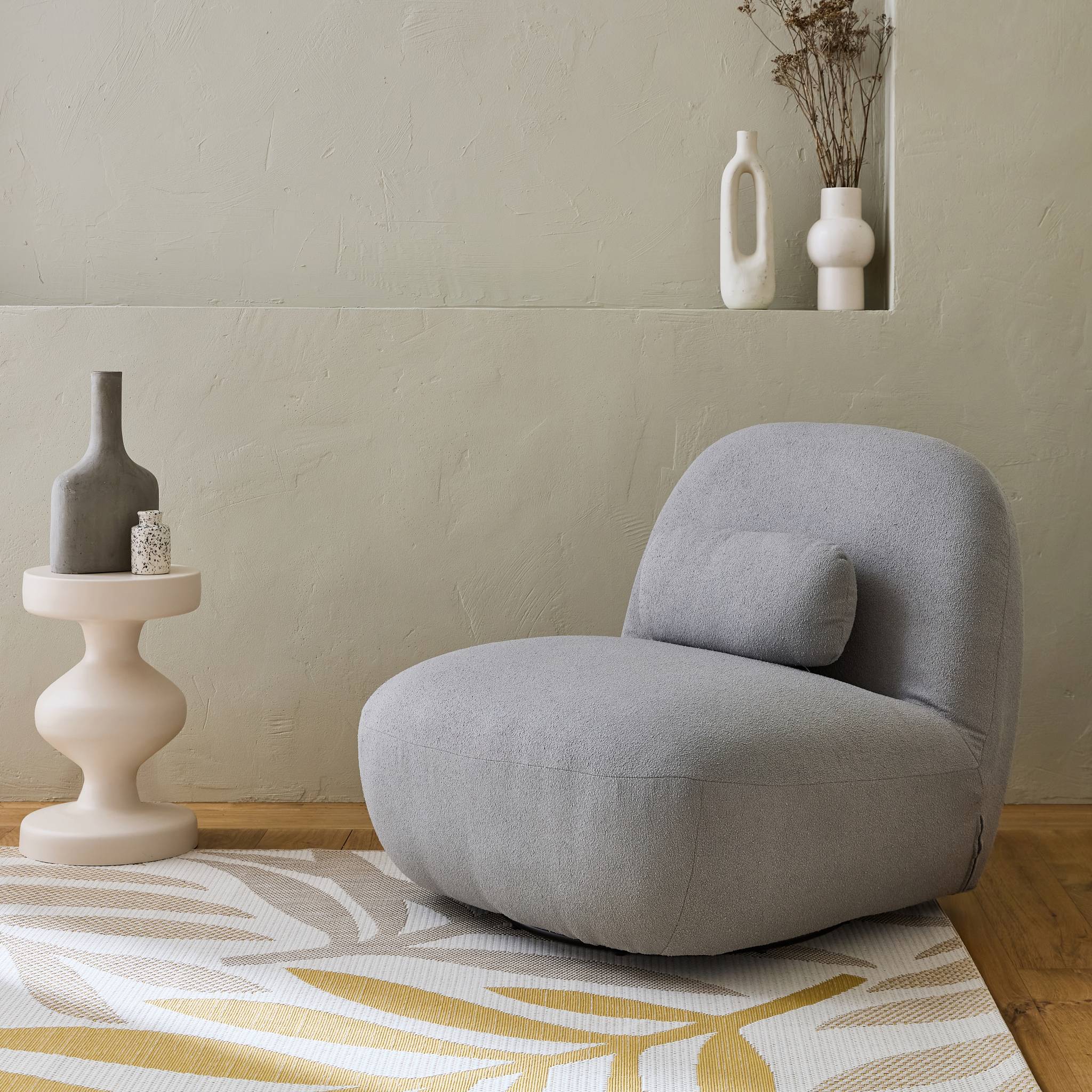 Fauteuil pivotant 360° en bouclette texturée gris clair. piètement en métal noir mat - SPINO