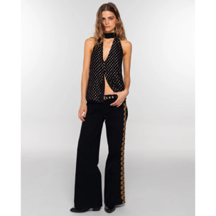 Top plumeti de mujer con escote en pico y lazada al cuello.