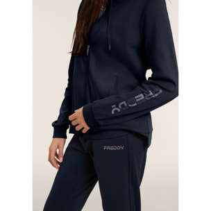 Tuta con zip e collo alto, logo con perline sulla manica