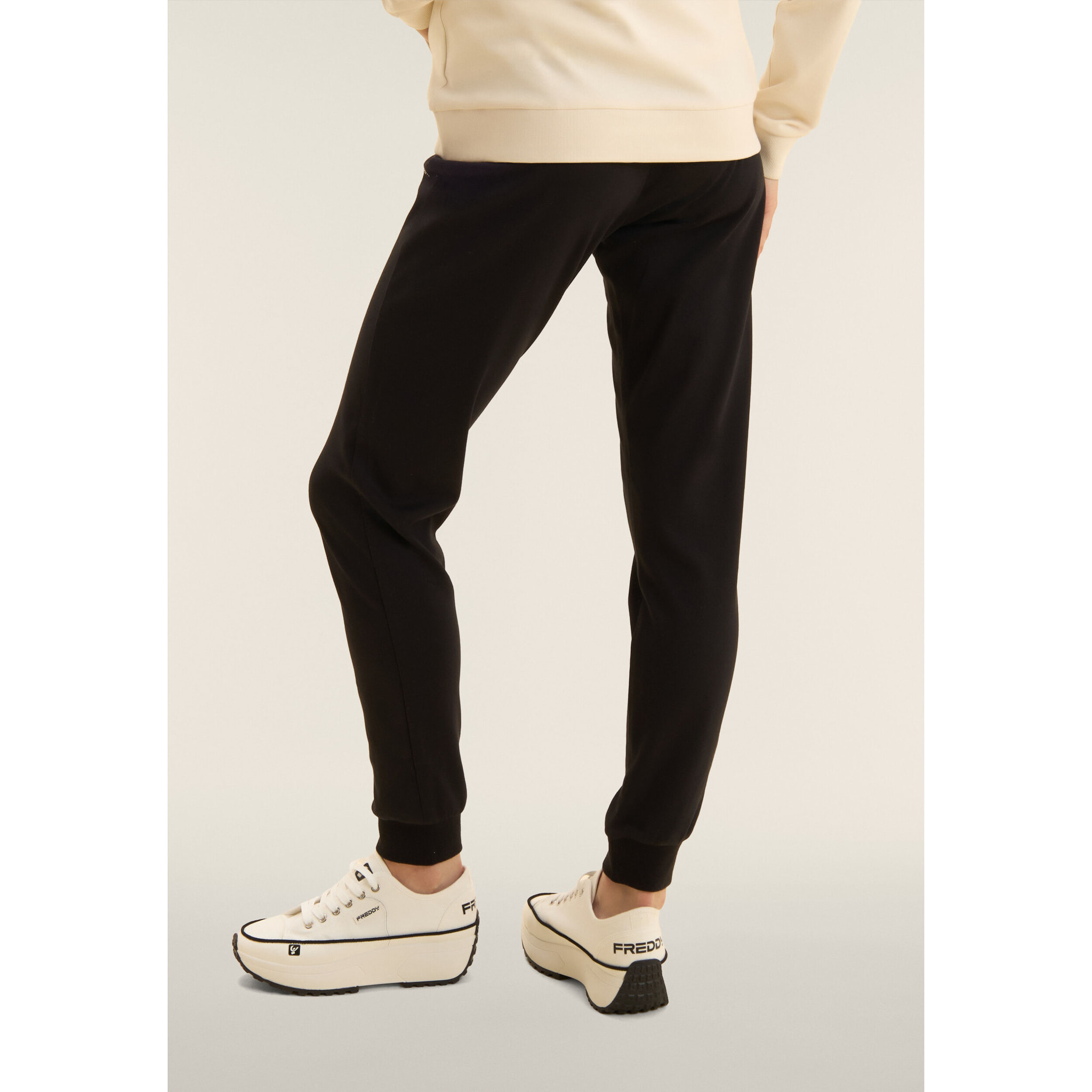 Tuta con zip e cappuccio con interno animalier