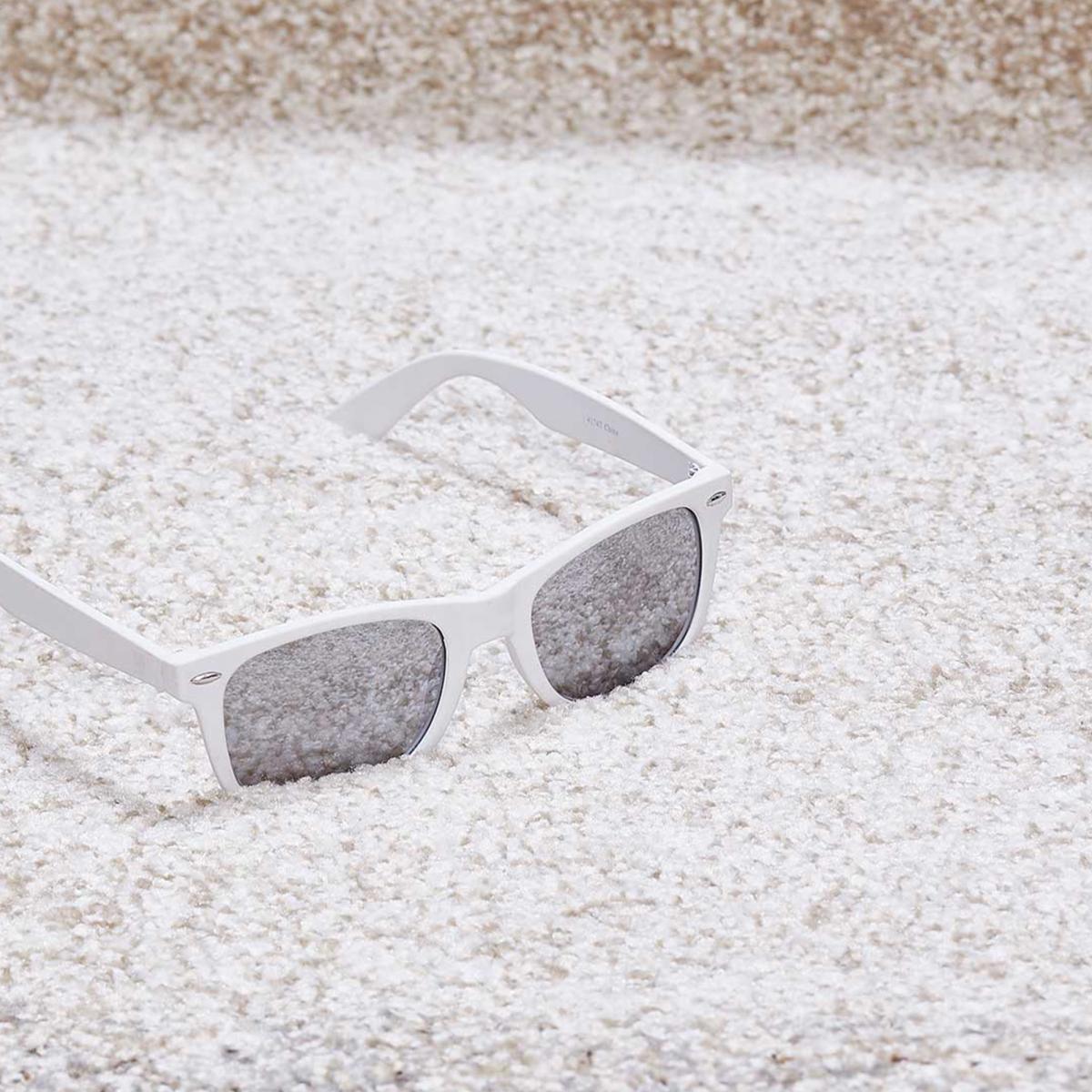 Tapis épais et moelleux Kude, motif faux uni