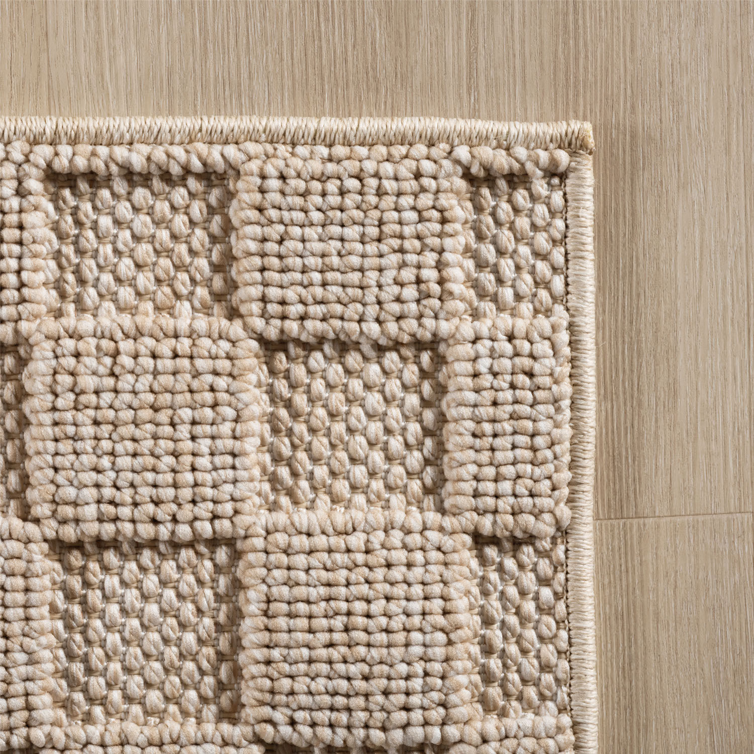 HELIX - Tapis moderne effet laine bouclé à motif damier en relief beige