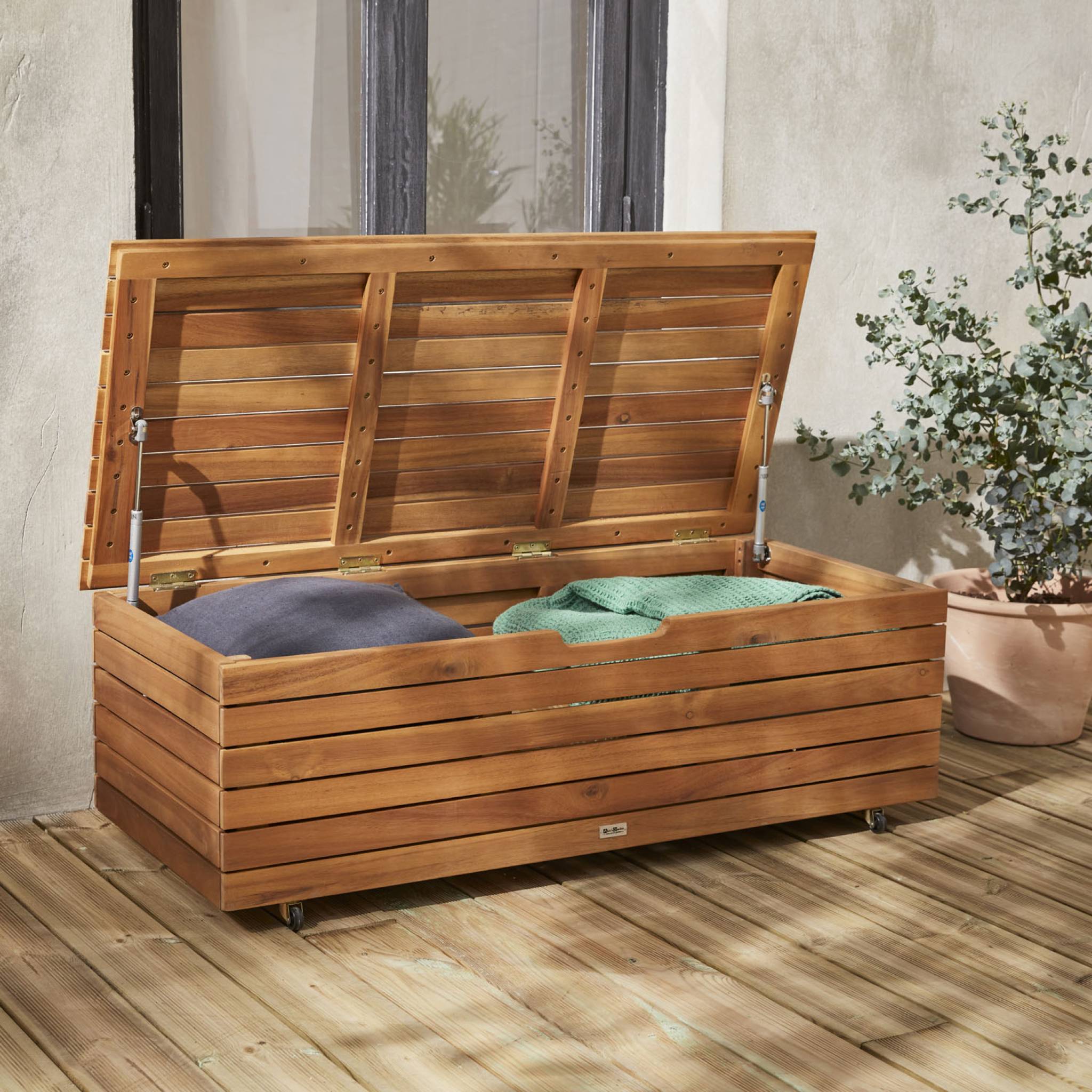 Coffre de jardin en bois - Saragosse - 130L. rangement coussins 107x48.5cm avec vérins et roulettes