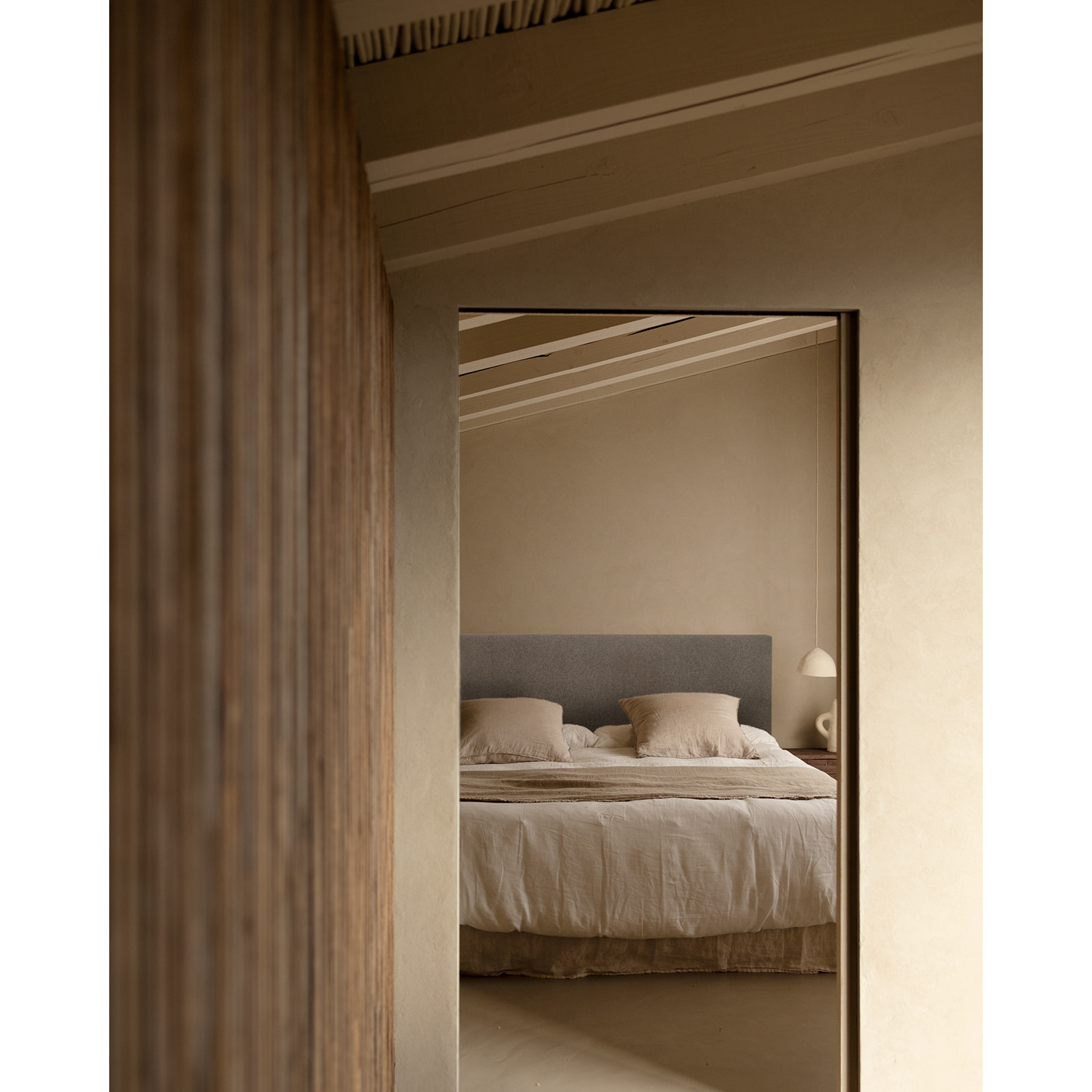 Cabecero tapizado de poliester liso en color gris de varias medidas