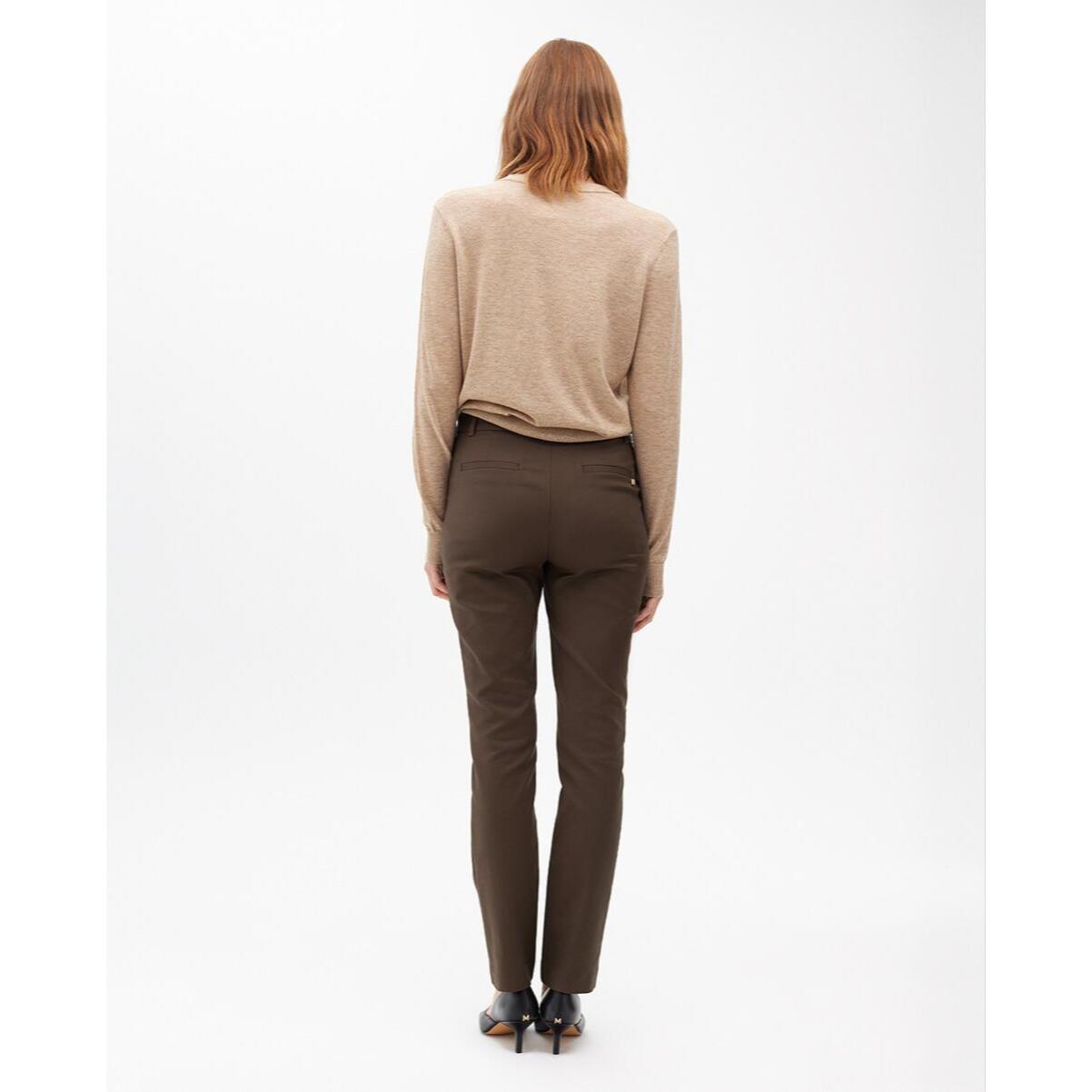 Pantaloni con tasche con zip in tessuto elastico