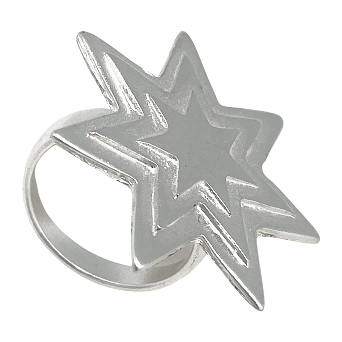 Anillo estrella relieve plata chapado 10µ latón. Diseño Gloria Mago