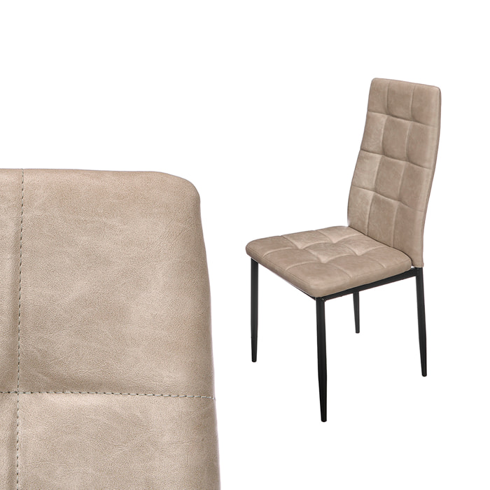 Silla con respaldo alto de cuero en color gris.