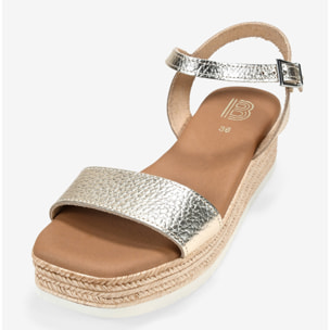 Sandalias doradas en piel con cuña efecto esparto
