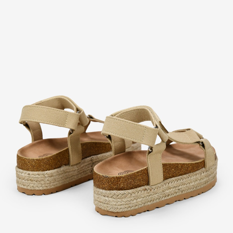 Sandalias deportivas beige con suela de corcho y plataforma