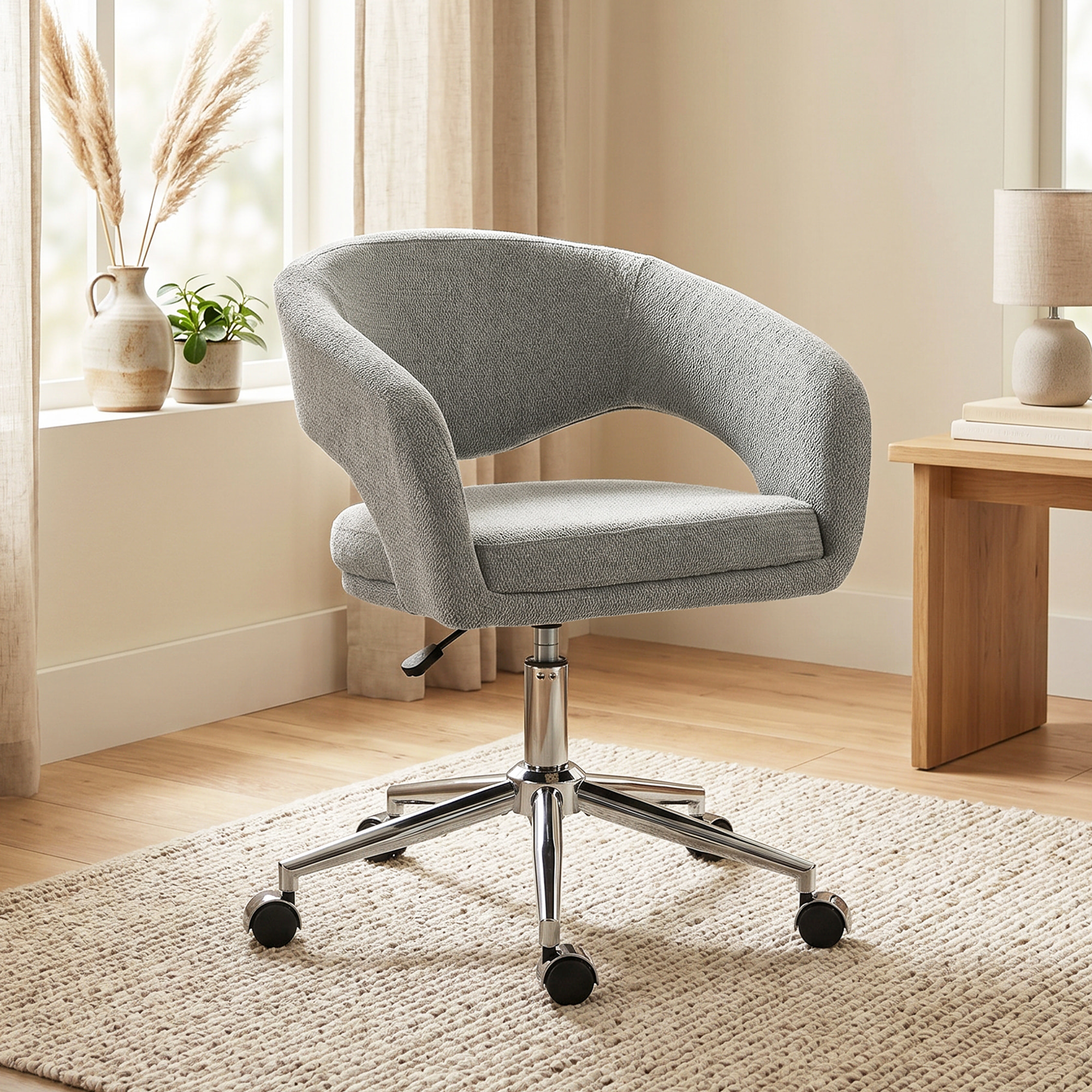 Chaise de bureau design ajouré enveloppant tissu gris
