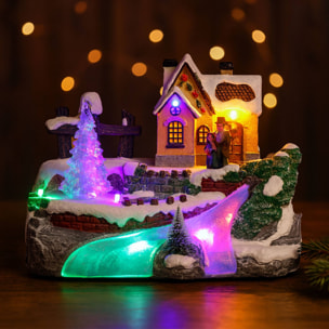 Escena invernal decorativa con movimiento y luces led - 2 diseños (surtido)