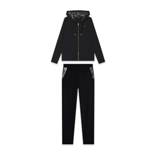 Tuta donna con zip, cappuccio e dettagli animalier