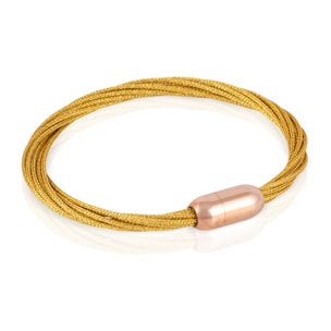 Pack de 4 pulseras multihebra entrelazadas de hilo de nylon verde, negro, dorado y blanco con cierre magnético de cobre.